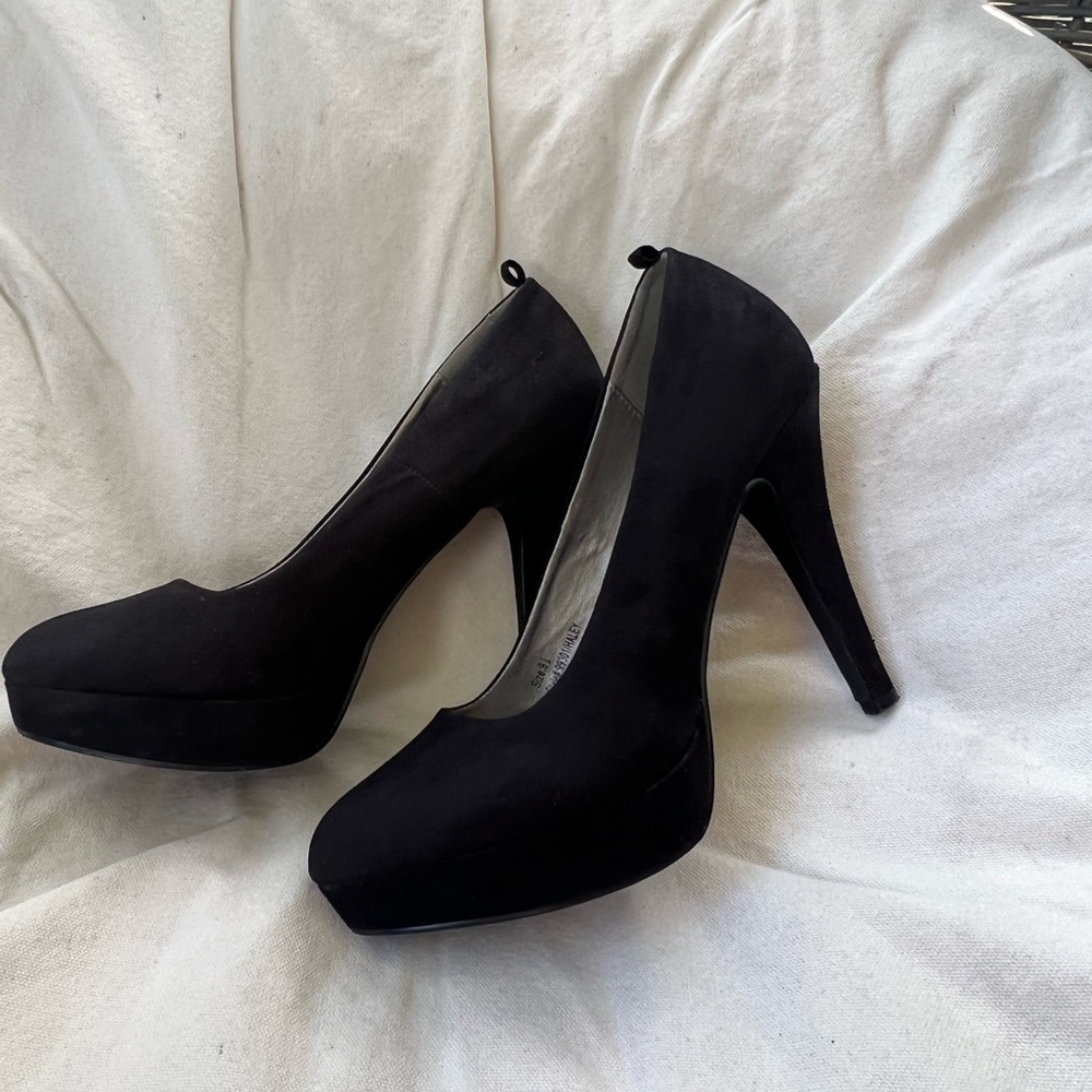 Woman’s black heels